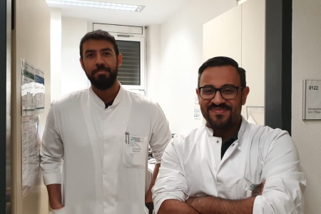 Teamomat: Zwei Kollegen vor der Tür